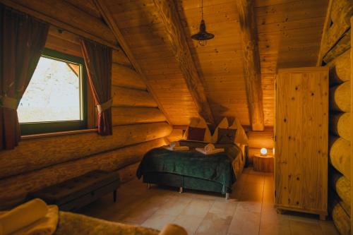 A bed or beds in a room at Adlerkopfhütte