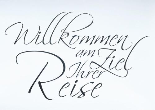 a handwritten inscription of mulremember an idle knee rise isolated on a white background at Hotel Niedersächsischer Hof in Goslar