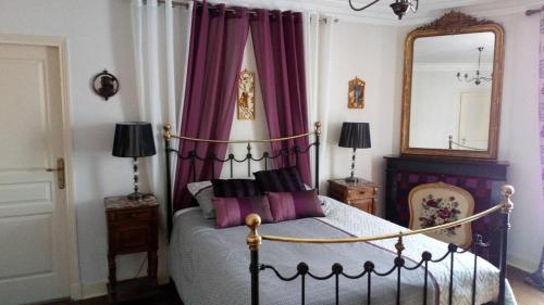 Cama o camas de una habitación en Chez Beaumont