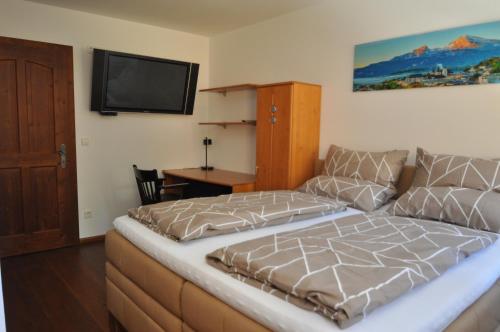 Postel nebo postele na pokoji v ubytování Apartments-Weberlandl