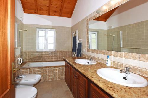 Ванна кімната в Villa de la Luz