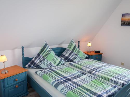 Postel nebo postele na pokoji v ubytování Apartment Janßen by Interhome