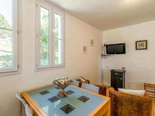 TV a/nebo společenská místnost v ubytování Holiday Home Maison Josée by Interhome