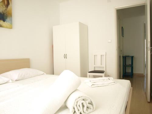 Cama o camas de una habitación en Caparica Beach House