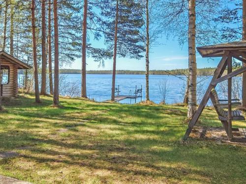 a view of a lake through the trees at Holiday Home Haapala by Interhome in Soini