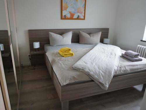 Posteľ alebo postele v izbe v ubytovaní Apart Schleswig ****