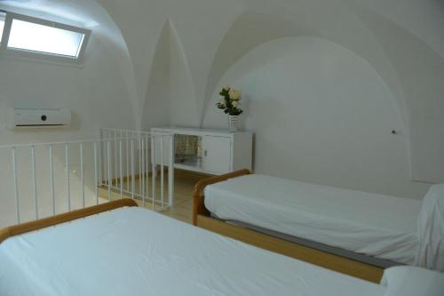 Posteľ alebo postele v izbe v ubytovaní Attico Palma