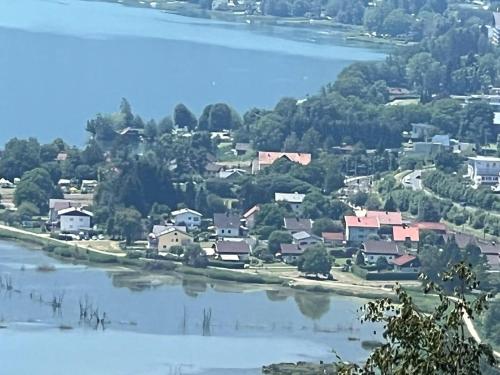 arial view of a village on the river at Ferienhaus Silja in Steindorf am Ossiacher See