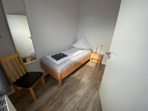 Ένα ή περισσότερα κρεβάτια σε δωμάτιο στο Tempel-inn Appartements Molkereistr. 2