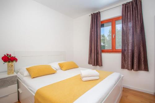 En eller flere senge i et værelse på House Serenity