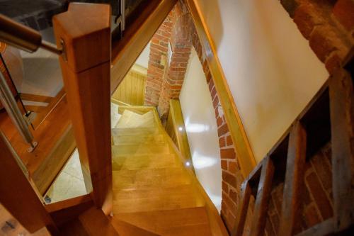 an overhead view of a staircase in a house at The Hyde Dovecote, Kinver in Stourbridge