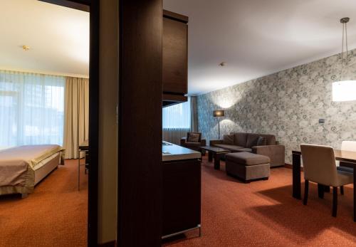 Кровать или кровати в номере Aquaworld Resort Budapest