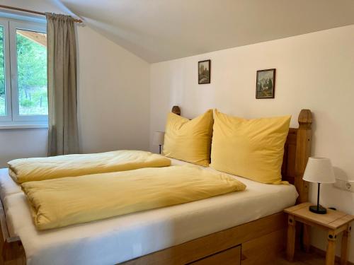 Кровать или кровати в номере Heissgut