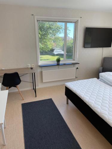 Postel nebo postele na pokoji v ubytování Workershotel Lysekil