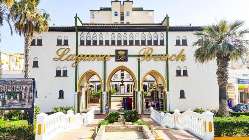 a building with a sign that reads lavertera hotel at Laguna Beach Paradise - Alojamientos La Torre in Torrox Costa