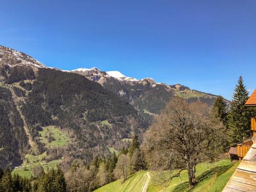 a view of the mountains from a house at Apartment Racer's Retreat Apt-2 by Interhome in Wengen