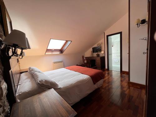 Postel nebo postele na pokoji v ubytování Hotel Rústico Finisterrae