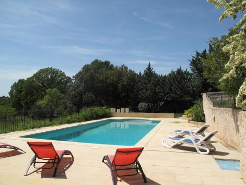 The swimming pool at or close to Holiday Home Le Mas du Magnoglia by Interhome