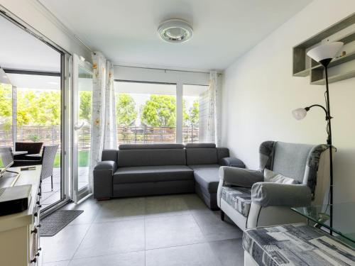 Televízia a/alebo spoločenská miestnosť v ubytovaní Apartment Marianna by Interhome