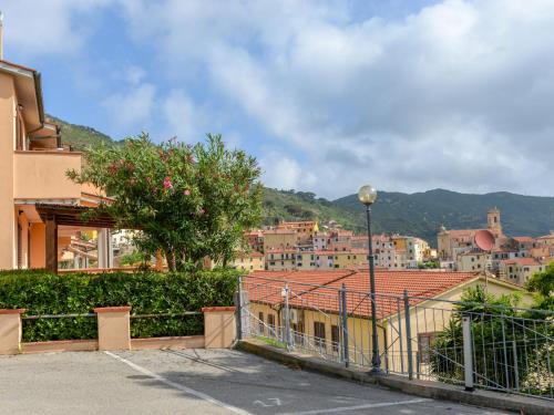 a view of a city with buildings and a tree at Apartment Terrazza di Paolo by Interhome in Rio nellʼElba