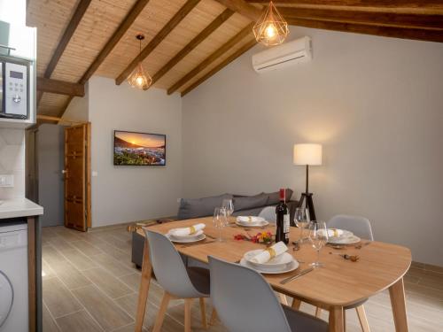 a dining room with a wooden table and chairs at Villa Riviera by Interhome in Sintra