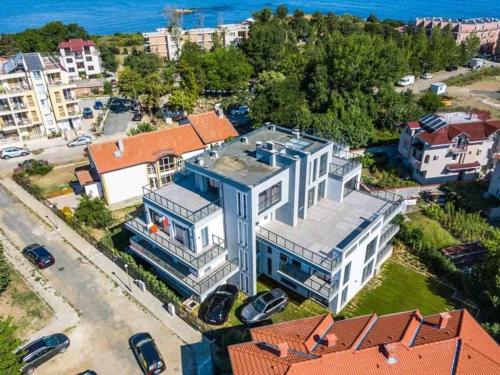an aerial view of a large white building at Apartament Kali in Ahtopol