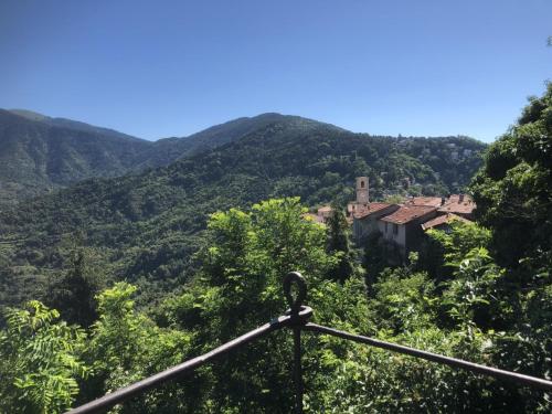 a view of a house in the mountains at A Panoramic Retreat in Baiardo