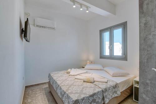 מיטה או מיטות בחדר ב-Sand house Antiparos