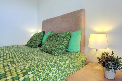 Ένα ή περισσότερα κρεβάτια σε δωμάτιο στο 2 bed-rooms with a view