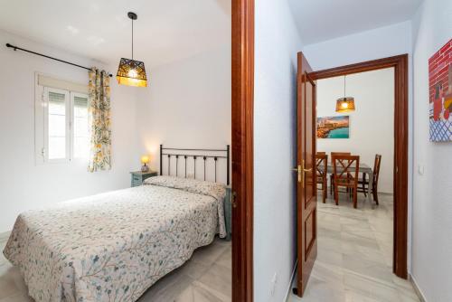 Posteľ alebo postele v izbe v ubytovaní Casa Melqart