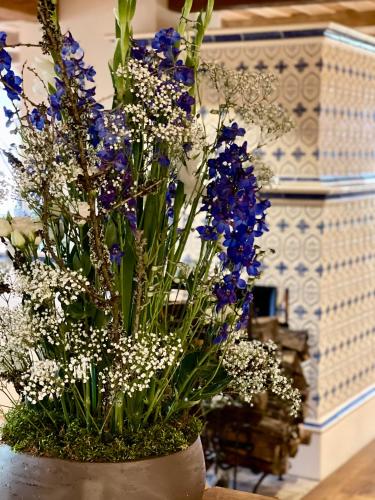 a bouquet of flowers in a vase on a table at Chata Hradečanka in Horní Malá Úpa