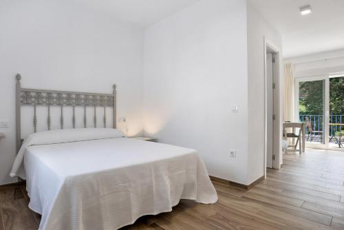 Ένα ή περισσότερα κρεβάτια σε δωμάτιο στο Casa de 10 - 1a