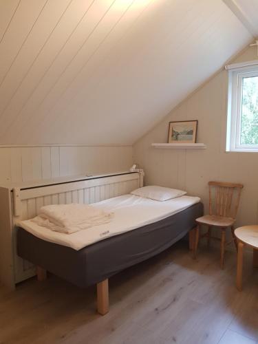 Ένα ή περισσότερα κρεβάτια σε δωμάτιο στο Nytt hus i lugn lantlig miljö