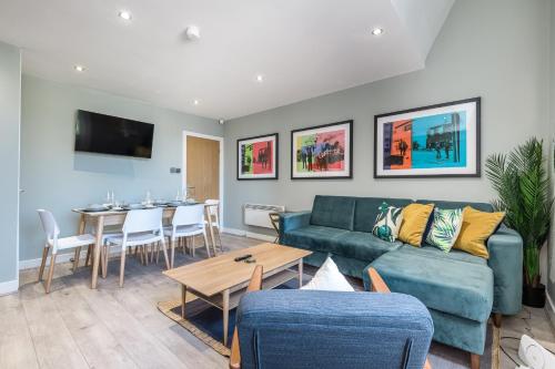 a living room with a couch and a table at Host & Stay - The Georgian Quarters at Canning in Liverpool