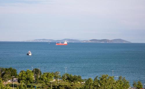two boats in a large body of water at Mula Hotel in Istanbul