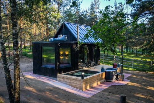 Zahrada ubytování BRENDIS -'Virš Ąžuolų' - Forest SPA - FREE jacuzzi