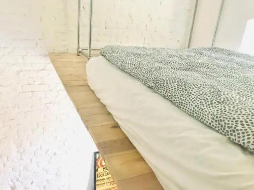 Postel nebo postele na pokoji v ubytování Apartament nad Jeziorem Długim