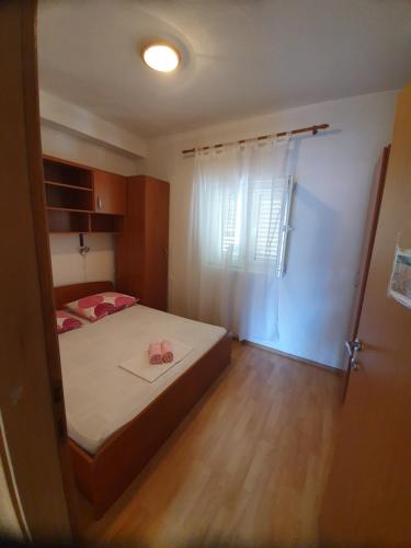 Posteľ alebo postele v izbe v ubytovaní Apartman Dušanka Jović