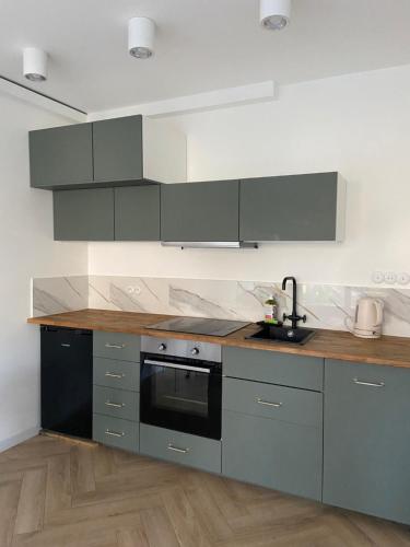 Dapur atau dapur kecil di Przytulny apartament, 200m od morza, Gdynia Orłowo