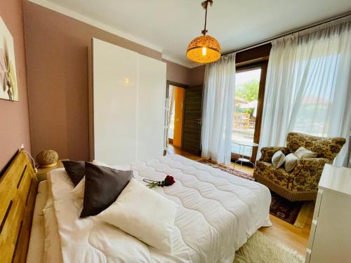 Ένα ή περισσότερα κρεβάτια σε δωμάτιο στο Casa Mimosa