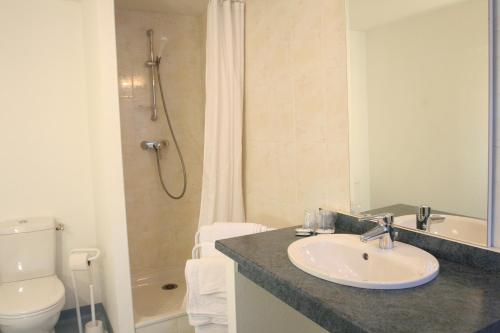 Koupelna v ubytování Hotel Christian