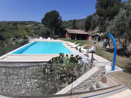 an image of a swimming pool in a villa at Villa Greco in Rossano