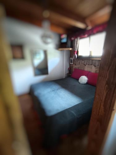 Ein Bett oder Betten in einem Zimmer der Unterkunft A casa di Ada B&B