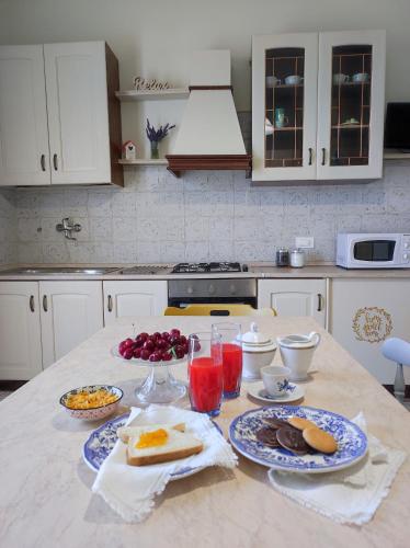 Kuchyň nebo kuchyňský kout v ubytování Camere Infinity Rooms