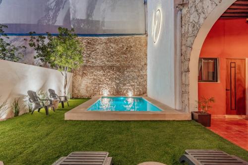 Bazén v ubytování Hotel HO Merida nebo v jeho okolí