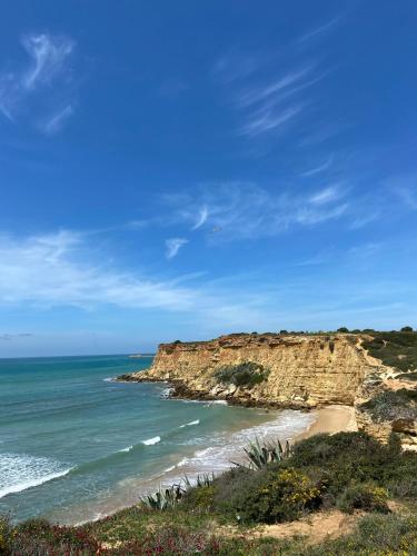 a view of the ocean and a beach at Hostal Los Mellizos in Conil de la Frontera