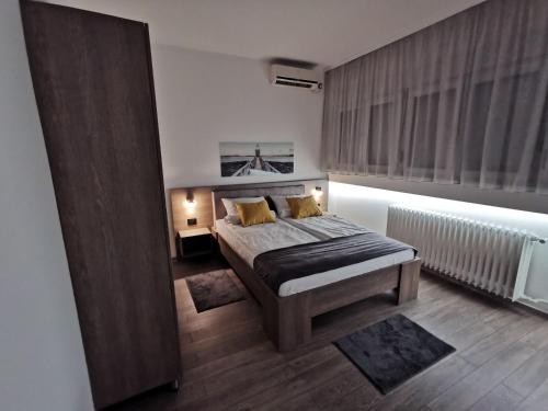 Apartman PAVLOVIC 1にあるベッド