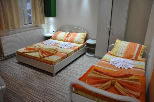 Postel nebo postele na pokoji v ubytování Rooms Turist
