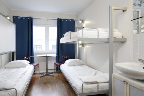 Postel nebo postele na pokoji v ubytování Hotel Copenhagen