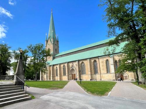 a large building with a steeple and a church at 4 person holiday home in LINKÖPING-By Traum in Linköping